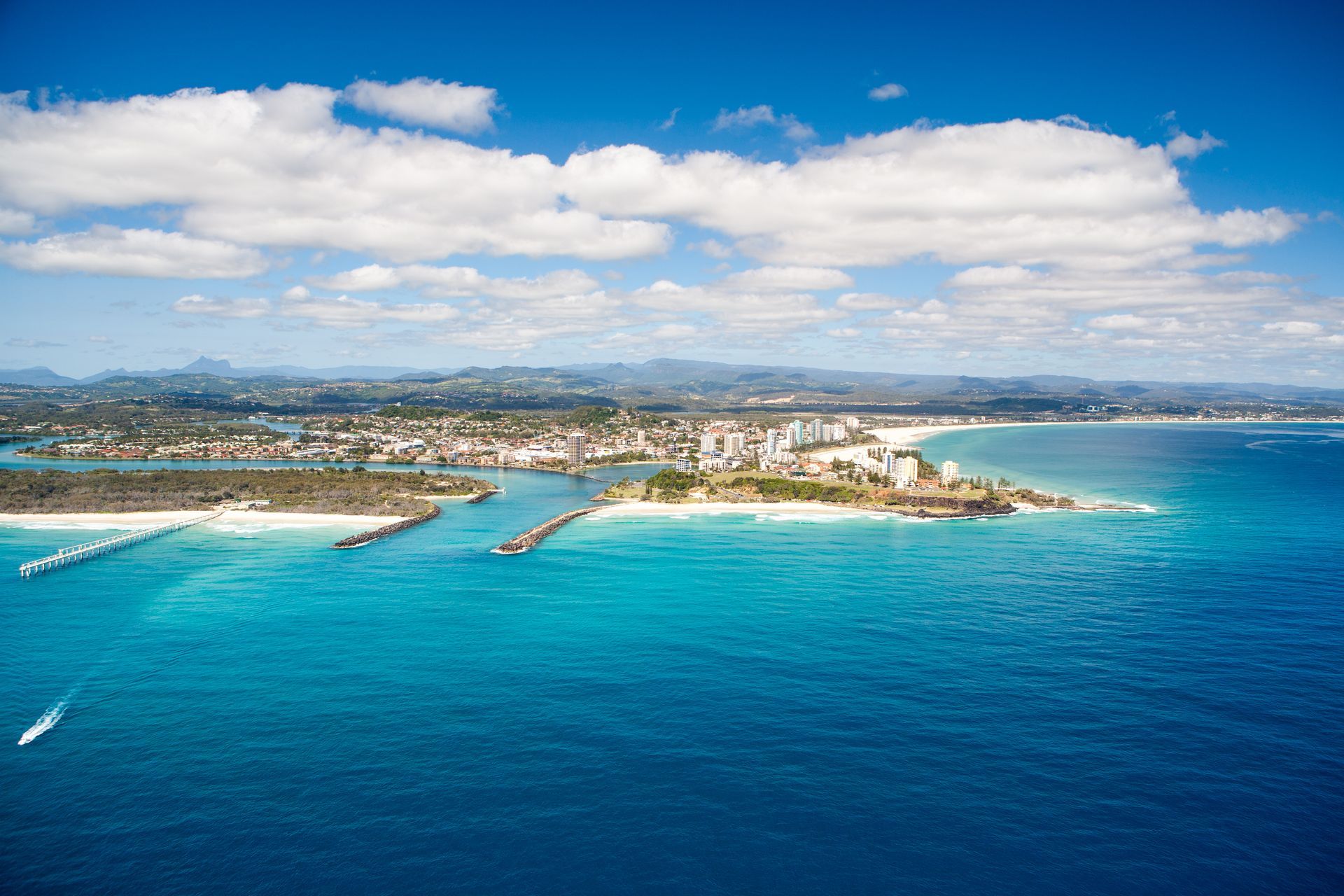 An Aerial View of a Small Island in the Middle of the Ocean — Approved Plumbing Service in River Heads, QLD