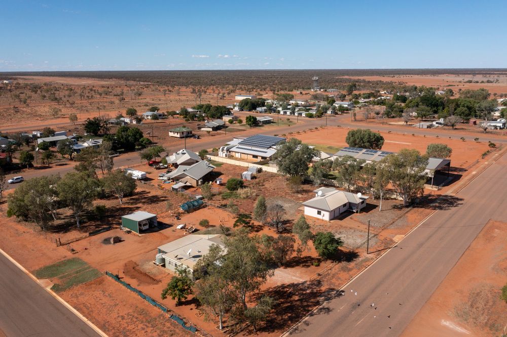 An Aerial View of a Small Town in the Middle of the Desert — Approved Plumbing Service in Howard, QLD