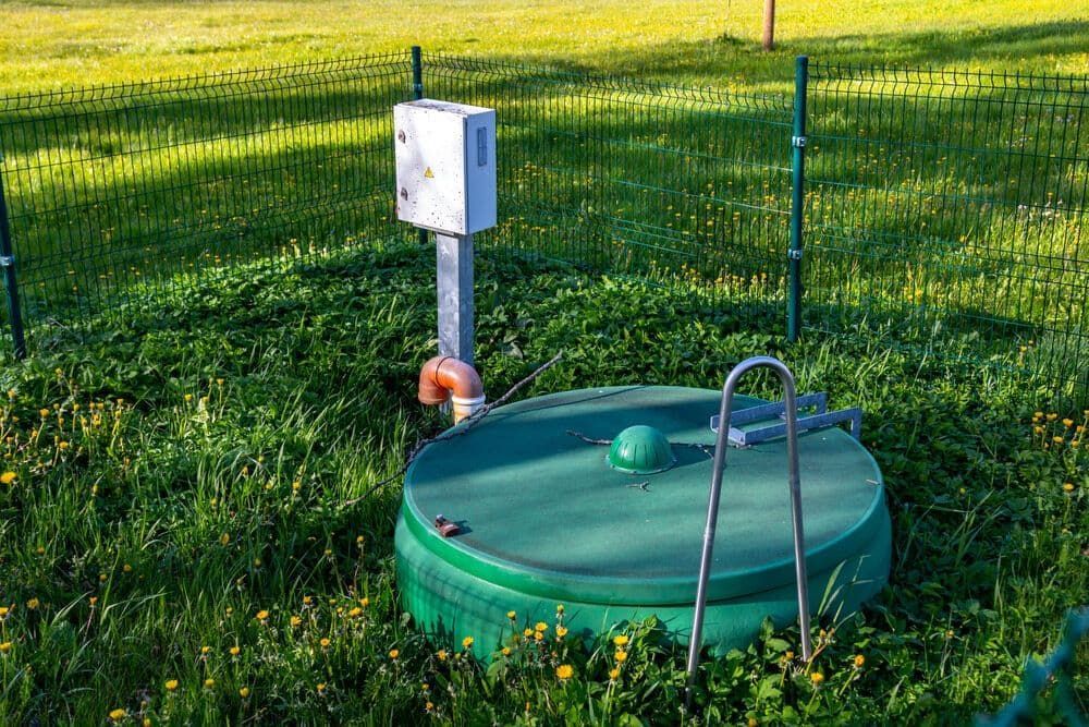 Green Septic Tank in Backyard — Approved Plumbing Service in Burrum Heads, QLD