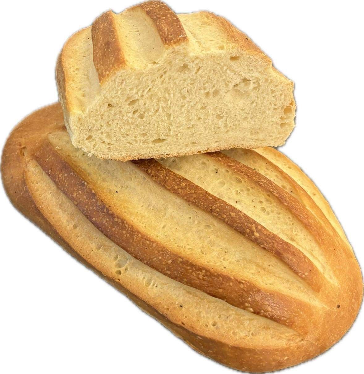 To brød er stablet oven på hinanden på en hvid baggrund.