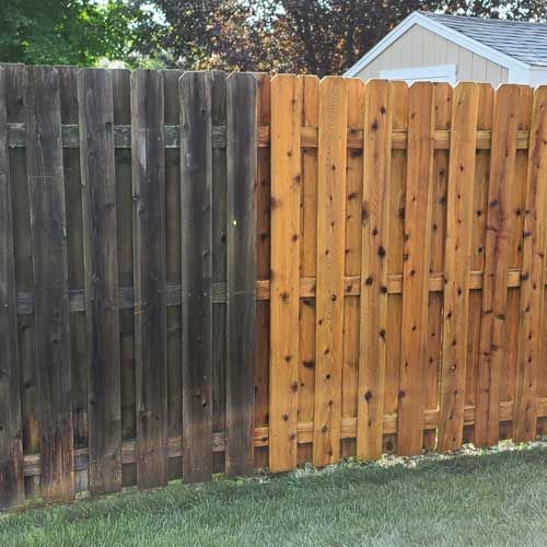 A before and after picture of a wooden fence.
