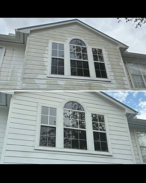 A before and after picture of a house Washing