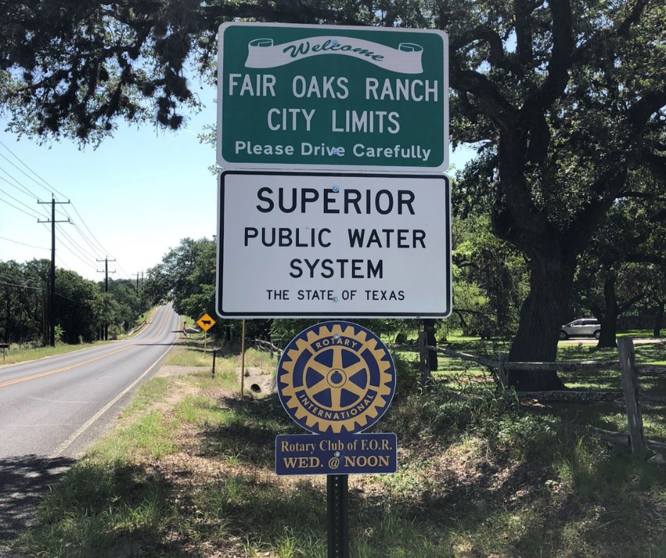 A sign for fair oaks ranch city limits and superior public water system