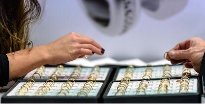 People looking at rings