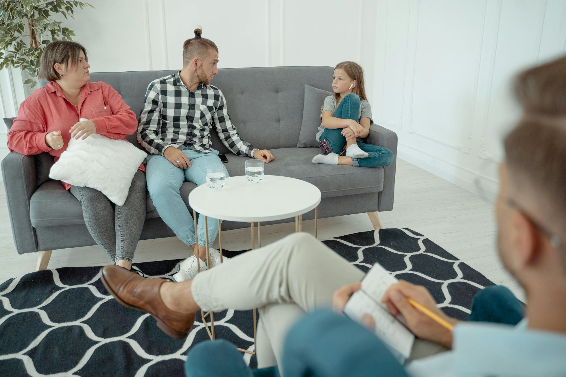 Systemisch gezinsgesprek met ouders, kind en behandelaar