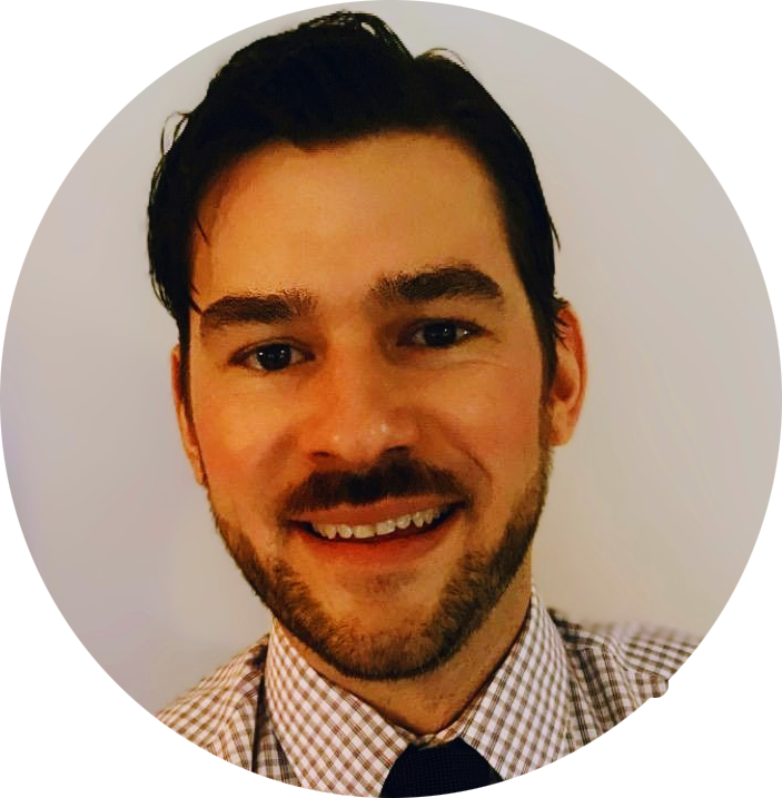 A man with a beard is smiling in a circle