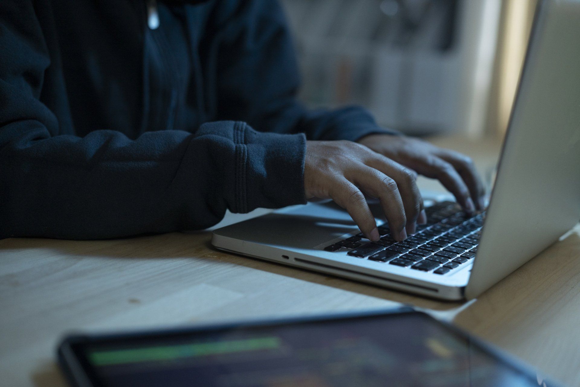 Person Using Laptop — Bradenton, FL — Sound Wealth Management Person Using Laptop — Bradenton, FL — Sound Wealth Management