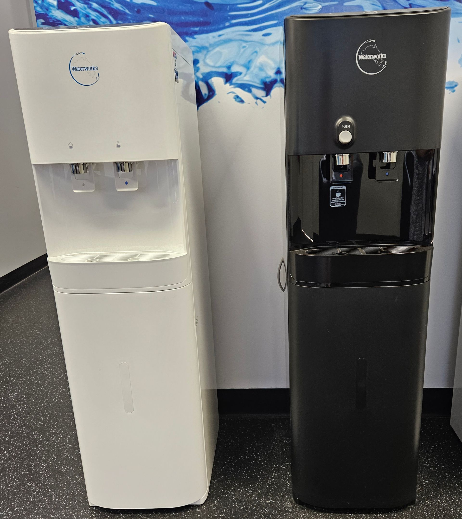 Two Water Dispensers Sitting Next To Each Other — Billabong Springs in Gold Coast, QLD