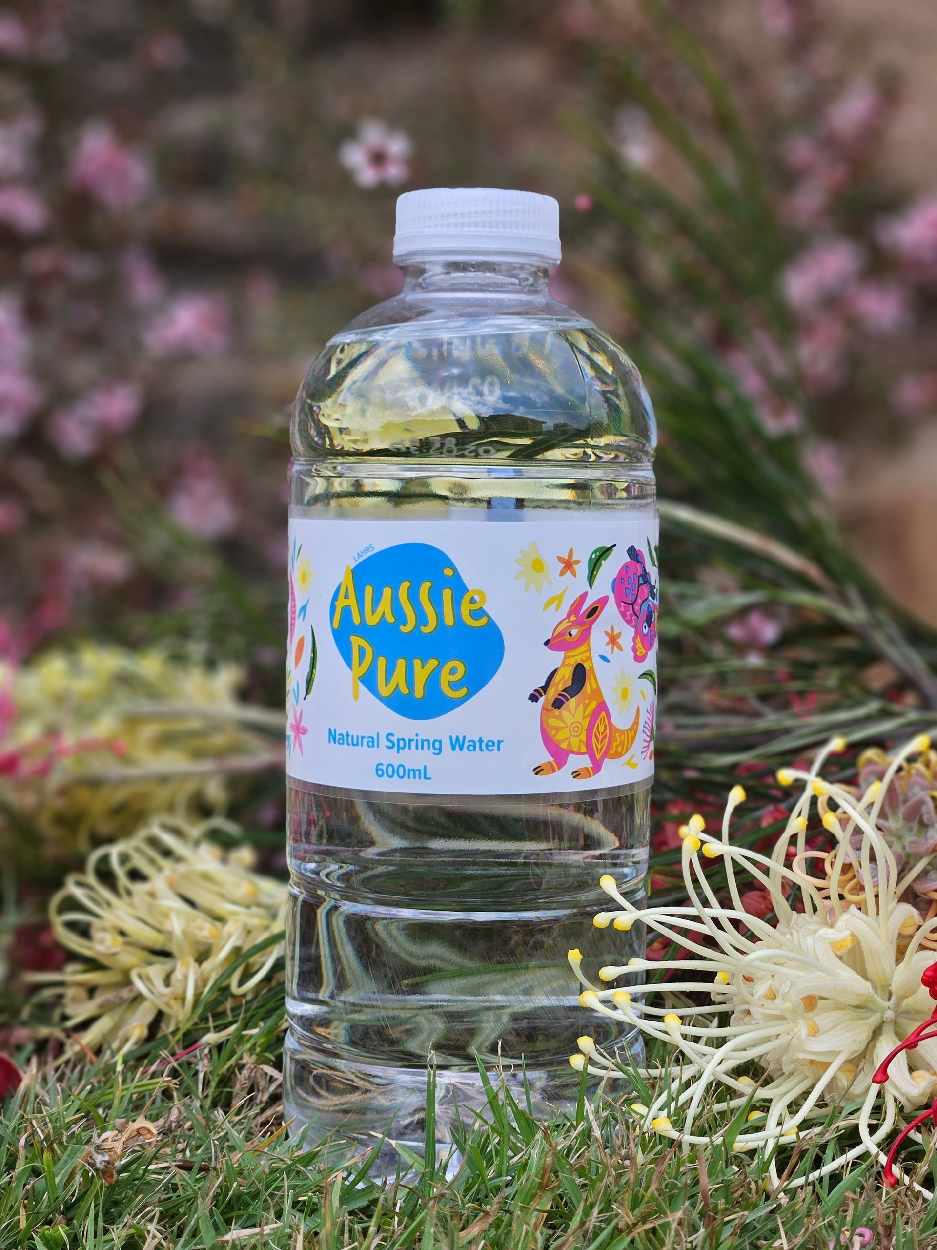 Two Bottles of Coolah Spring Water on A Table — Billabong Springs in Jimboomba, QLD