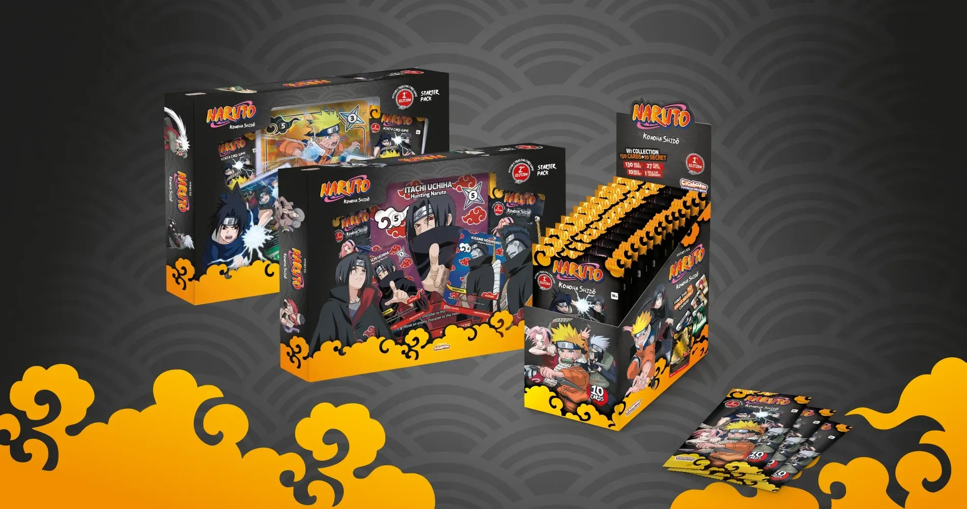 Three black-and-orange Hot Wheels race car toy boxes and packs on a dark patterned background