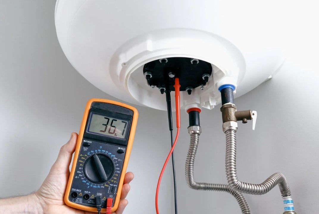 Derbyshire Plumbing & Heating Specialists testing a hot water tank in Ilkeston