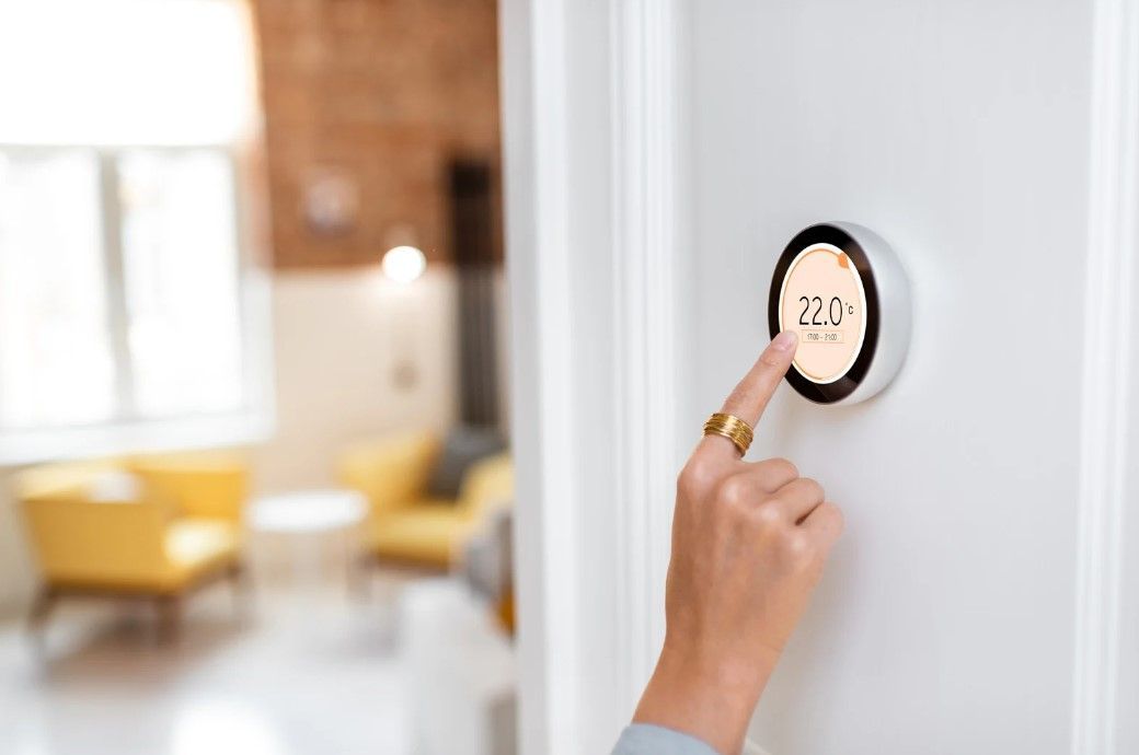 Derbyshire Plumbing & Heating Specialists letting customer control heating from a new smart heating controller in Derby