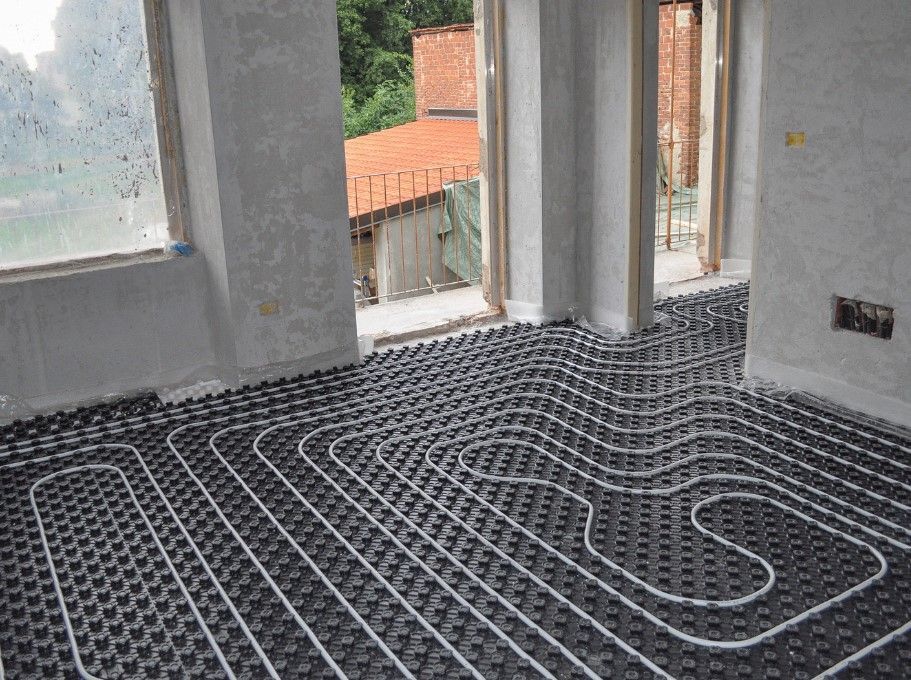 Derbyshire Plumbing & Heating Specialists installing underfloor heating as part of renovation in Derby