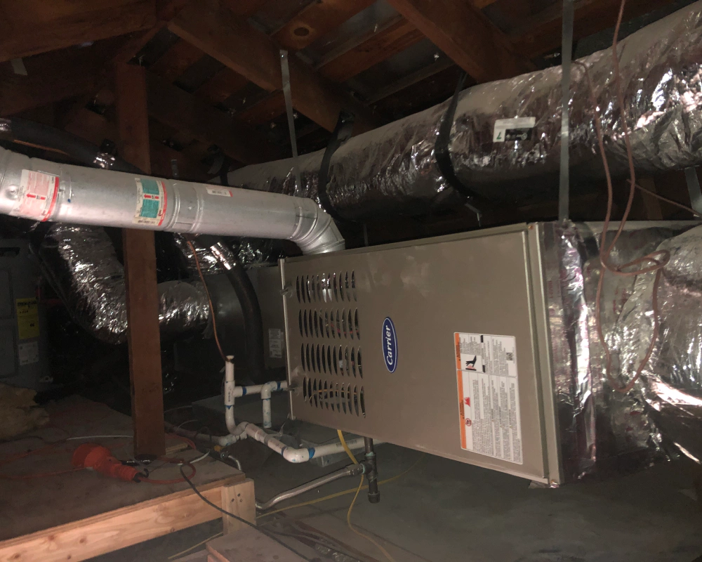 There is a furnace in the attic of a house.