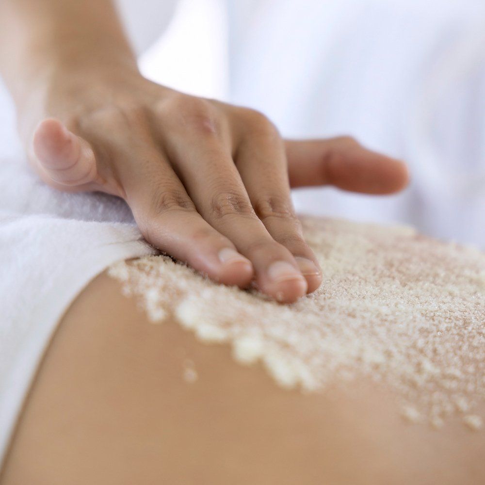 Having Salt Scrub On The Spa — Great Neck, NY — Butterfly Garden Spa Having Salt Scrub On The Spa — Great Neck, NY — Butterfly Garden Spa