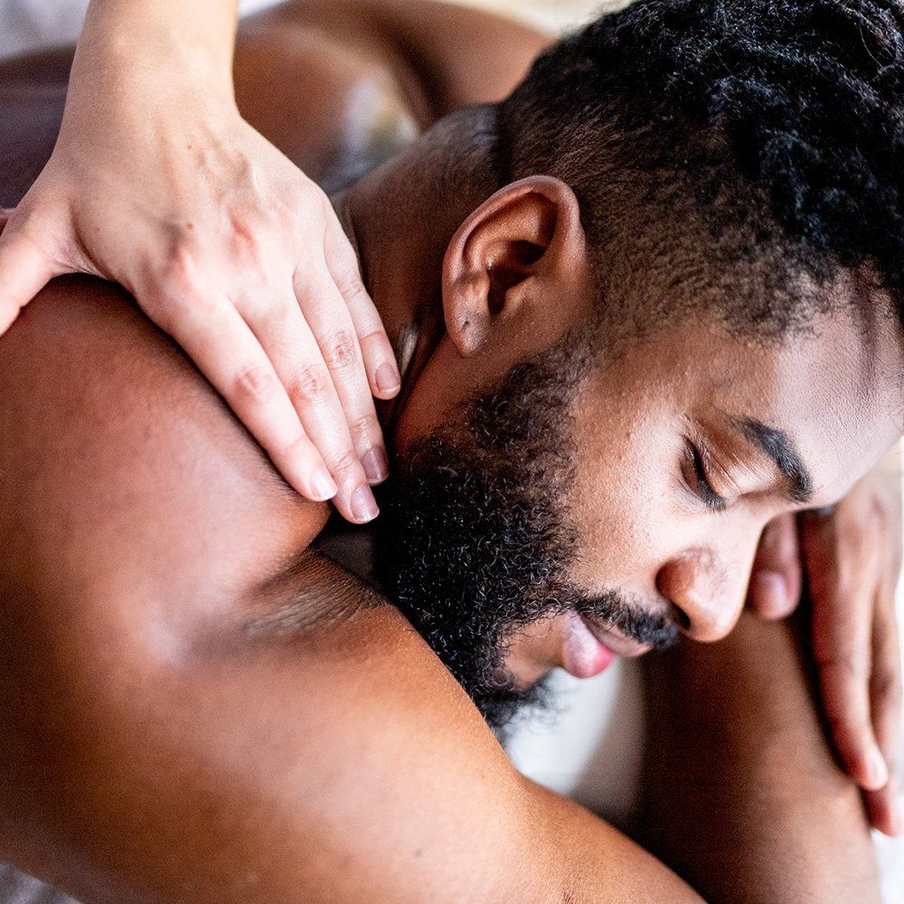 Mature Man Relaxing On A Massage — Great Neck, NY — Butterfly Garden Spa Mature Man Relaxing On A Massage — Great Neck, NY — Butterfly Garden Spa