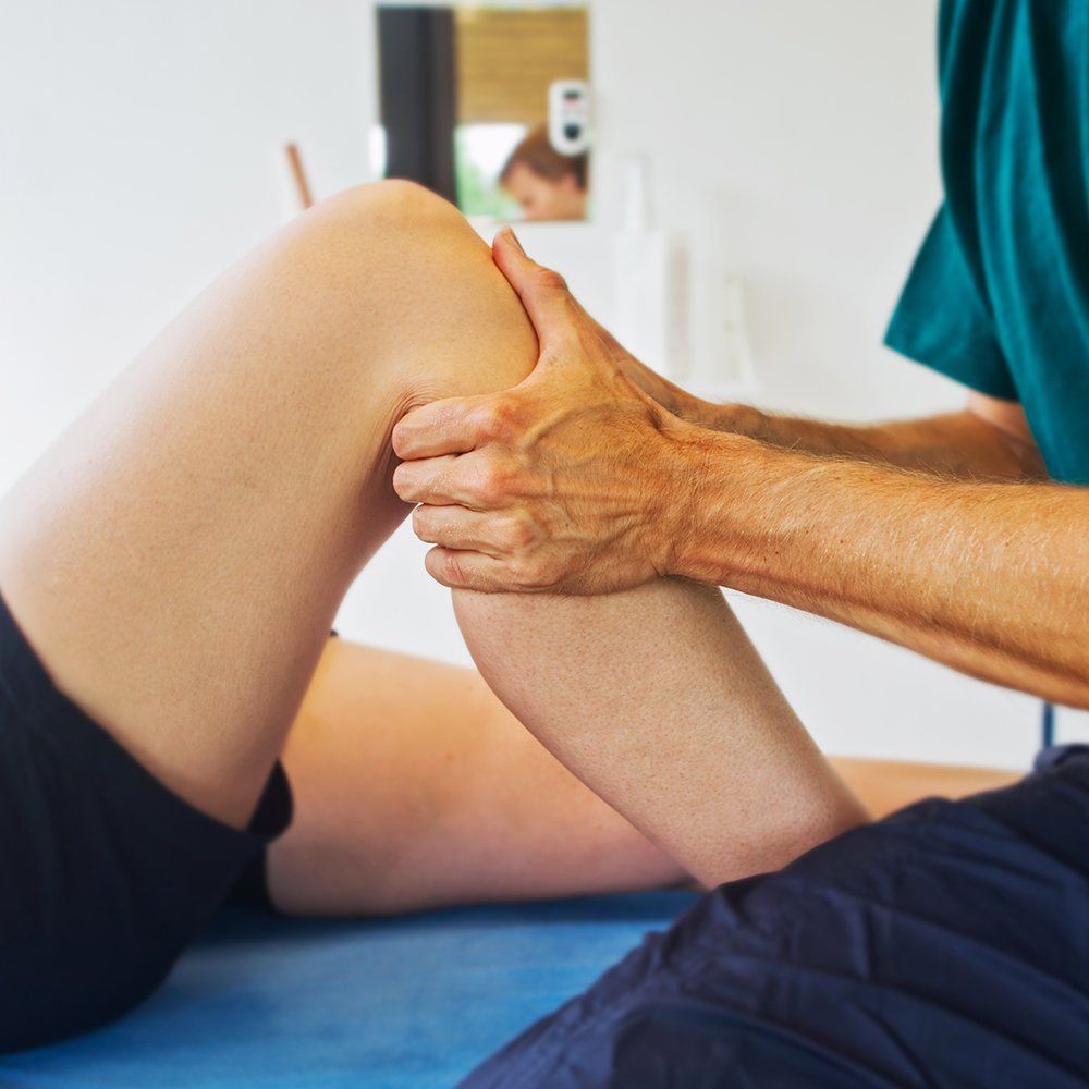 Knee Massage — Great Neck, NY — Butterfly Garden Spa Knee Massage — Great Neck, NY — Butterfly Garden Spa