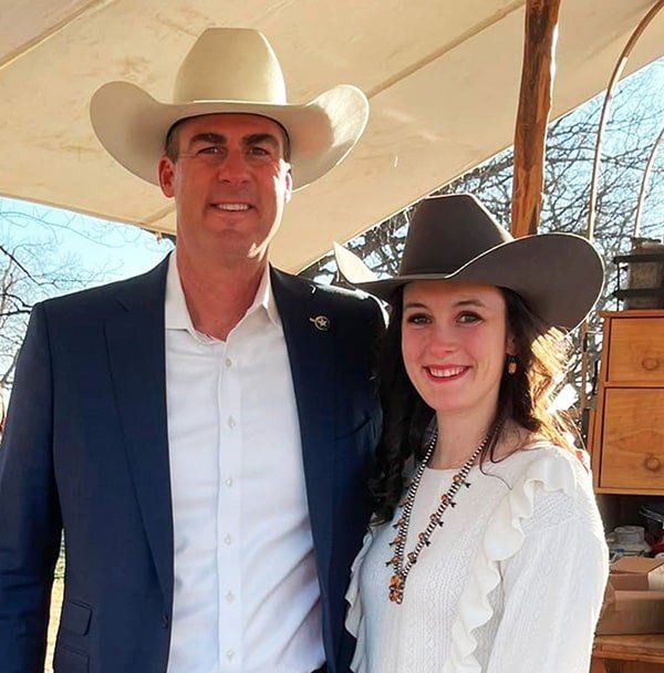 Becca Garrett and Oklahoma Governor J. Kevin Stitt, March 24, 2022 Becca Garrett and Oklahoma Governor J. Kevin Stitt, March 24, 2022