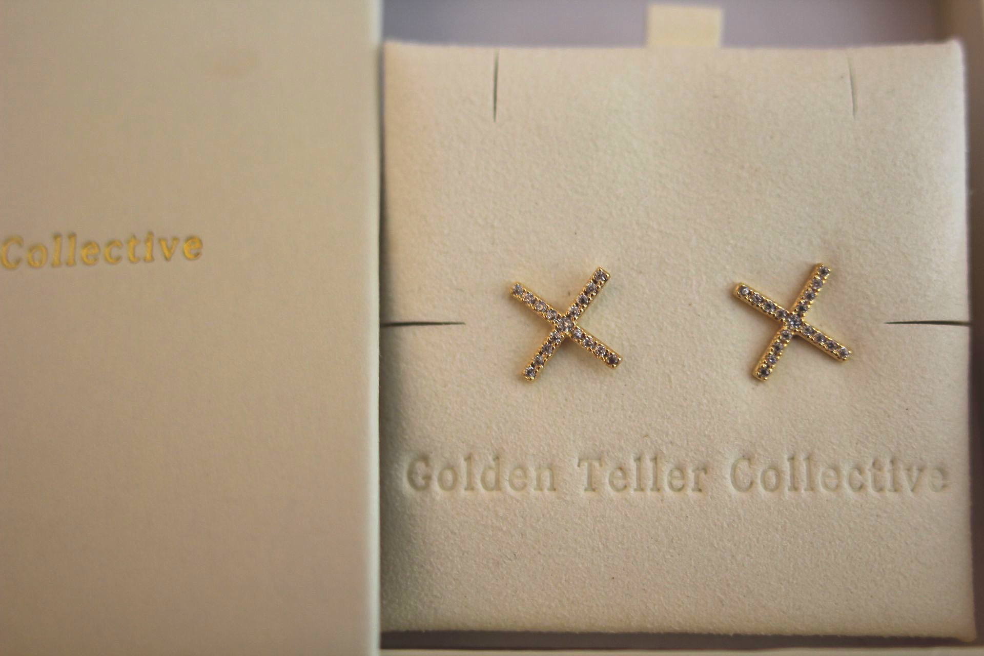 X stud earrings