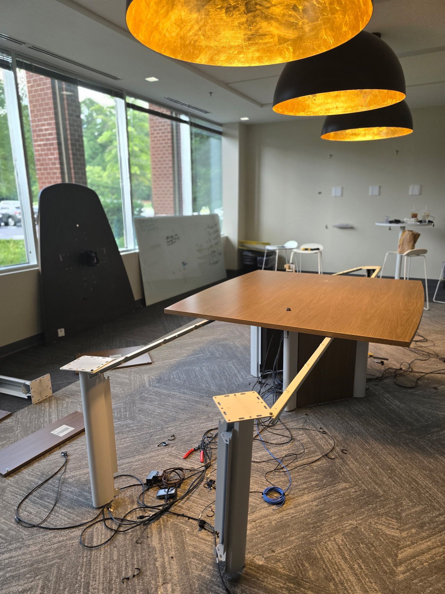 Office space with partially disassembled desk to be safely transported to another office in Cary, NC.