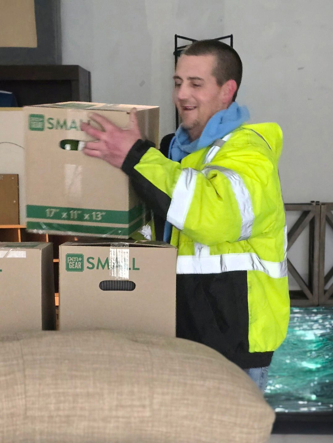 Scott with labeled moving boxes during a Jones Helps U Move packing service