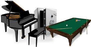 Piano, large safe, and pool table representing Jones Helps U Move's specialized moving services in Wake County