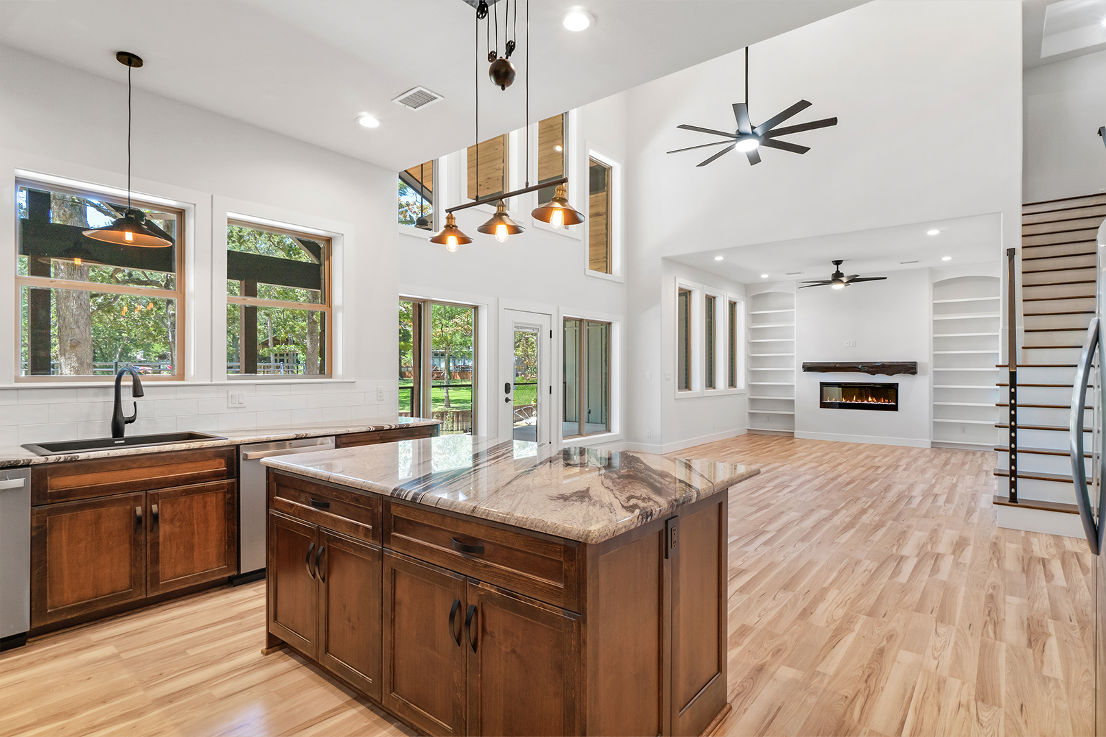 There is a large island in the middle of the kitchen.