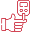 Red line icon of a hand holding a smartphone with a sad face on the screen