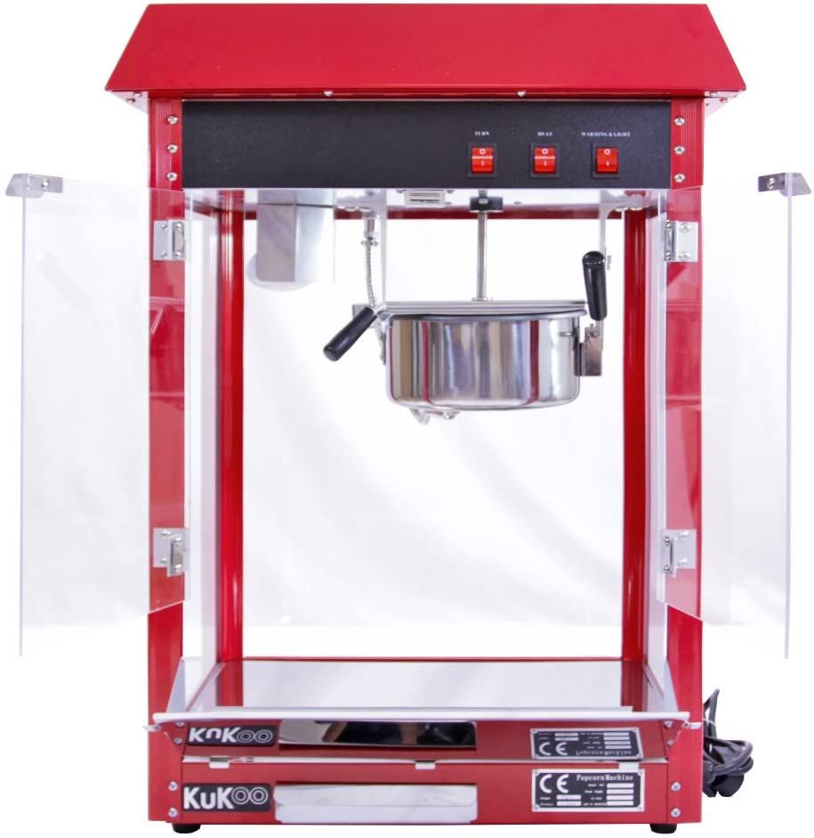 Rode popcornmachine met roestvrijstalen pot, acryl deuren en bedieningspaneel.