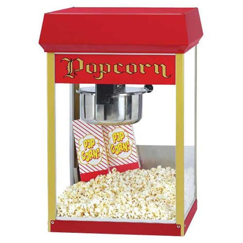 Popcornmachine Gold Medal Rode en gouden popcornmachine met twee zakken, gevuld met popcorn.