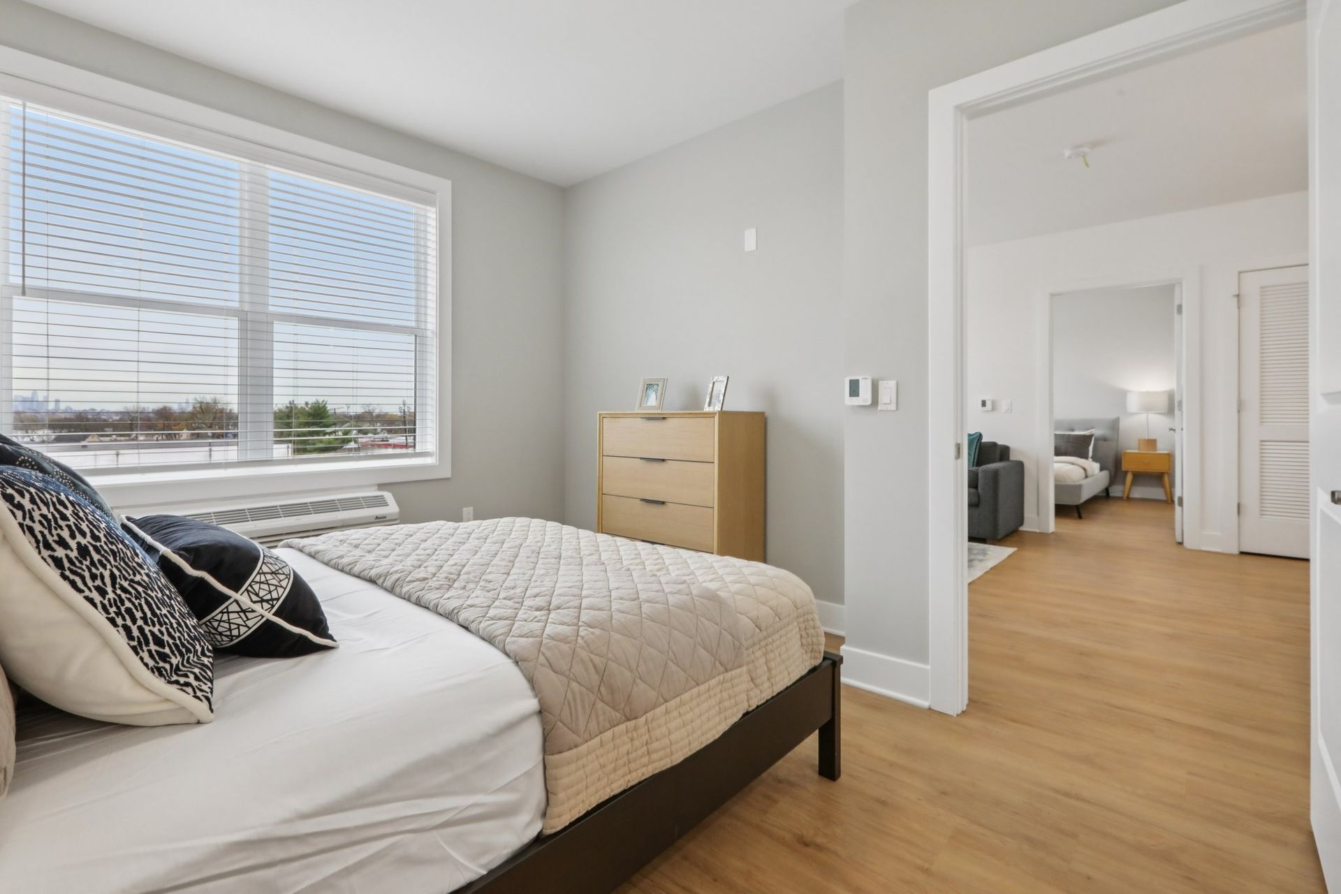 Bright bedroom with modern furnishings at Meridia Little Ferry apartments Bergen County NJ