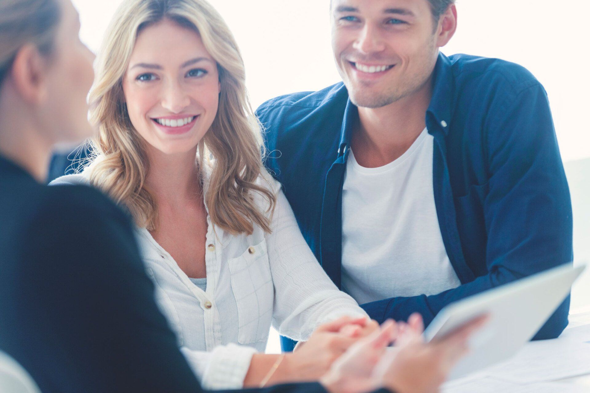 Real Estate Agent with Couple Looking Through Documents — Geelong West, Vic — Geelong Finance Company