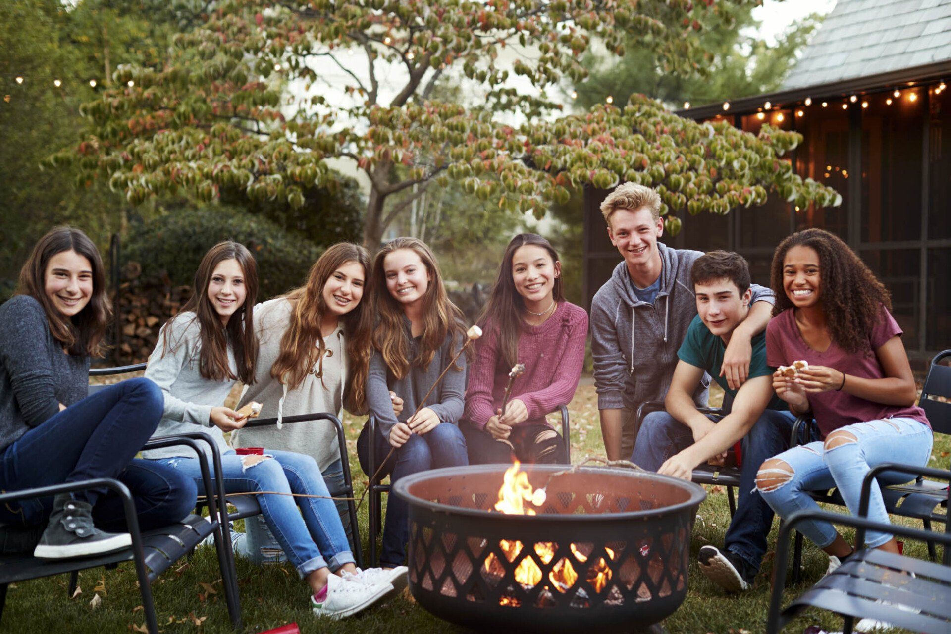 friends around fireplace