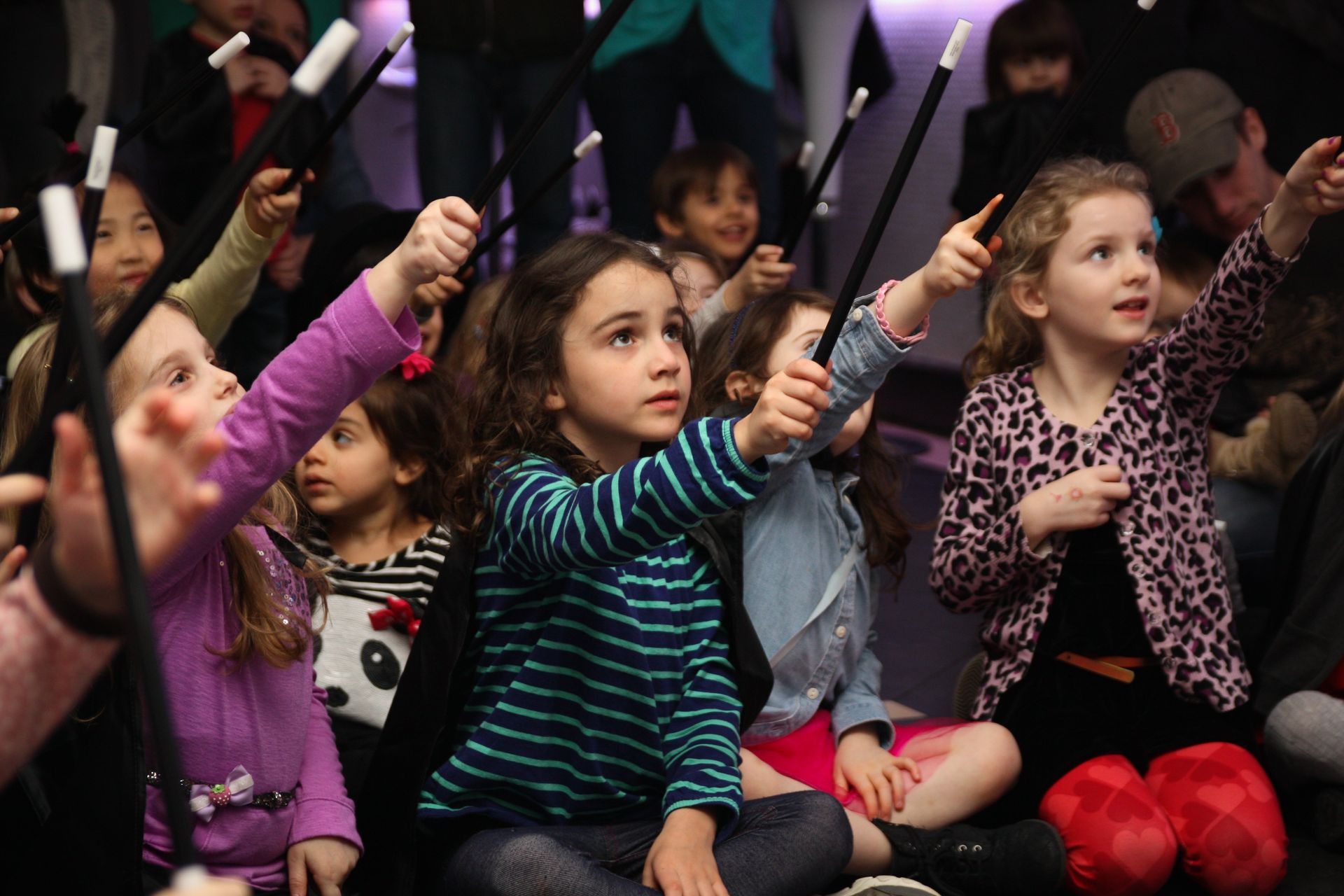 kids holding magic wands
