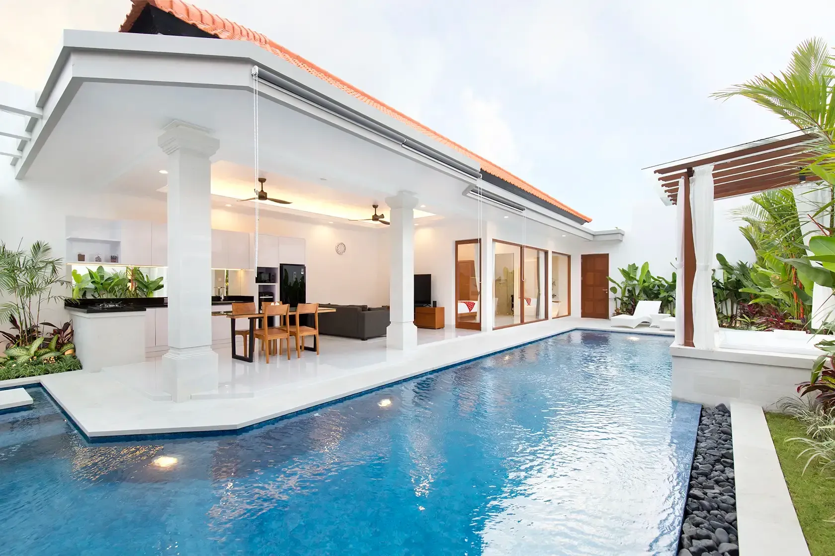 Large private pool surrounding the open plan living area at Villa Mia Dasa in Seminyak, Bali
