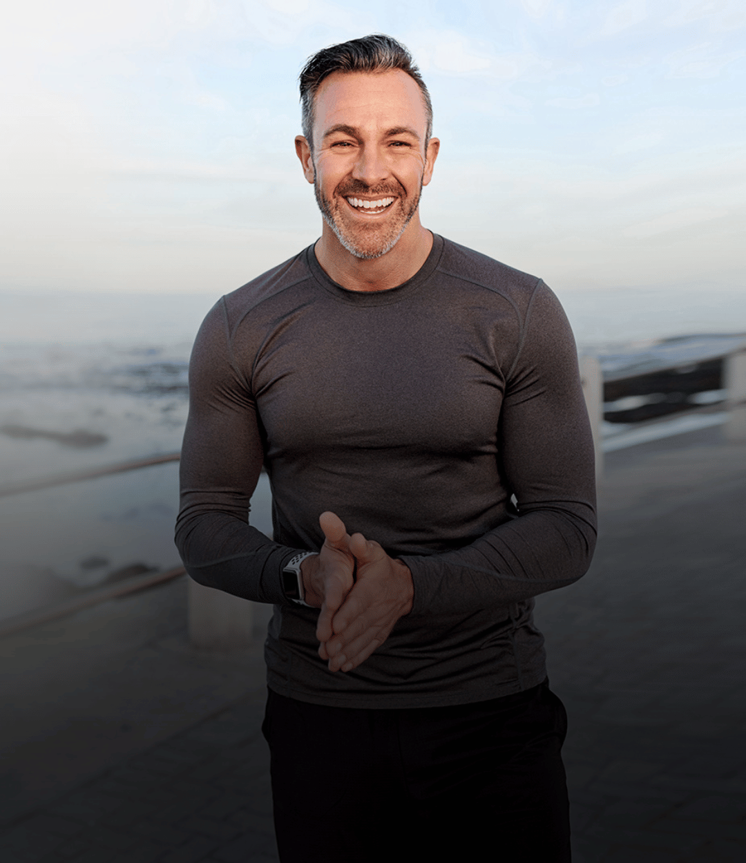 A healthy, active man smiling outdoors