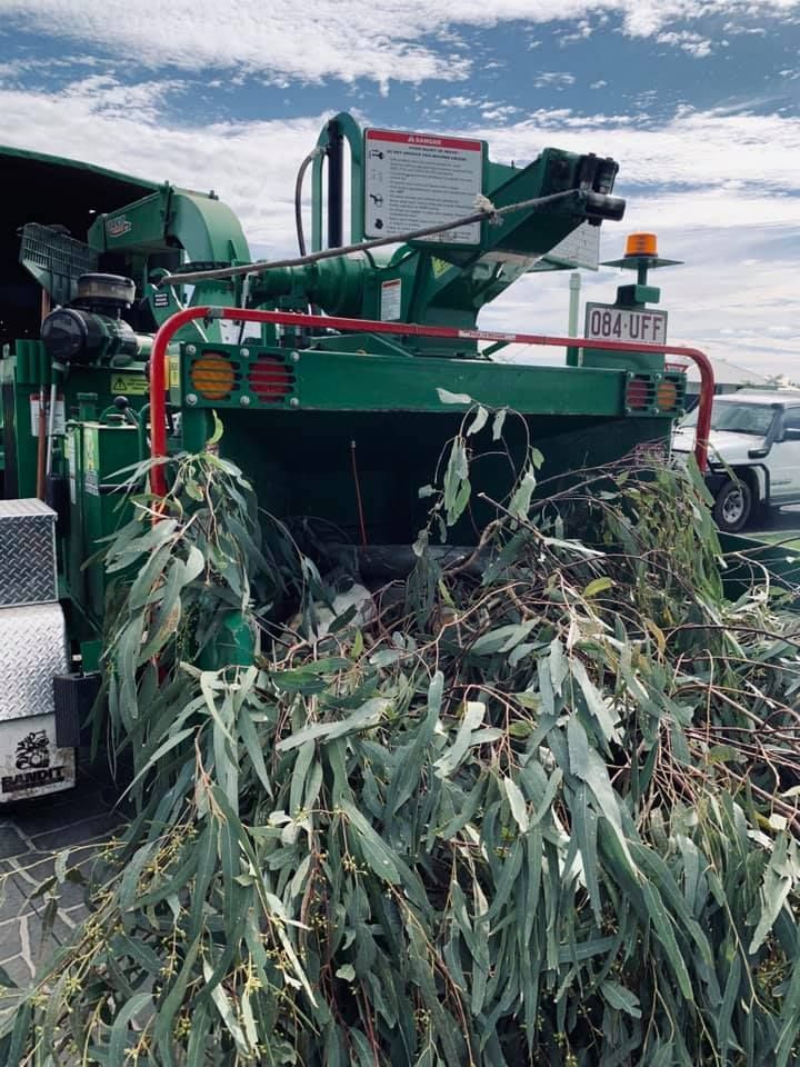 Mulching the Garden Worker In Excavator— Mulching Toowoomba Region