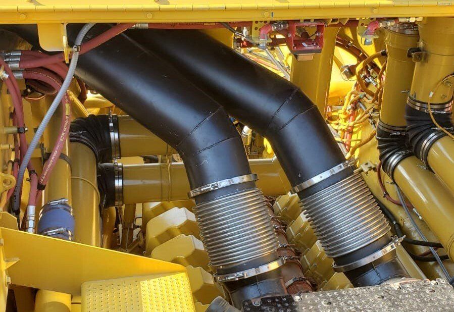 Replacement exhaust system for haul truck