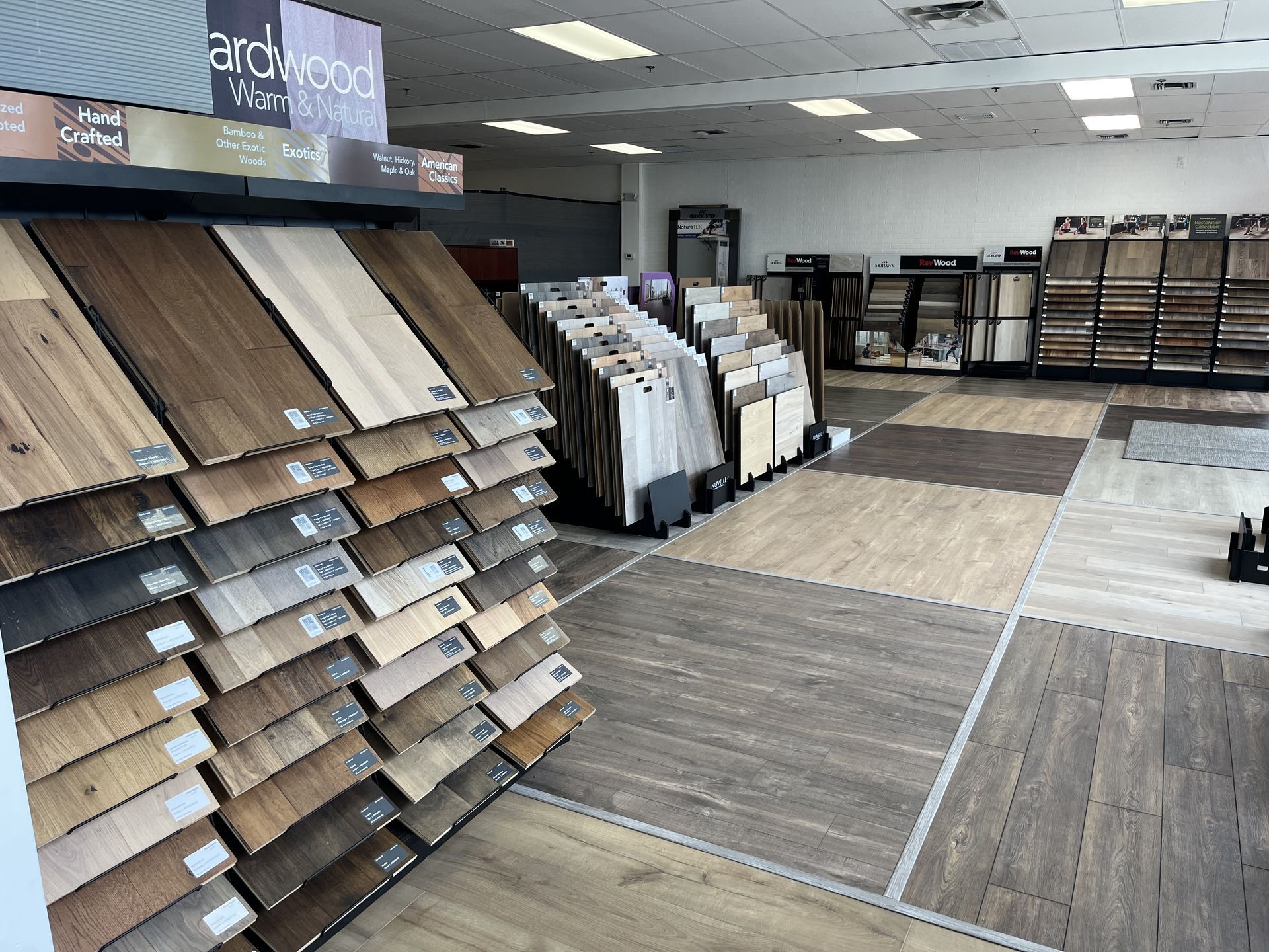 Modern living room in Winter Park, FL with luxury vinyl plank flooring, showcasing a 2024 flooring t
