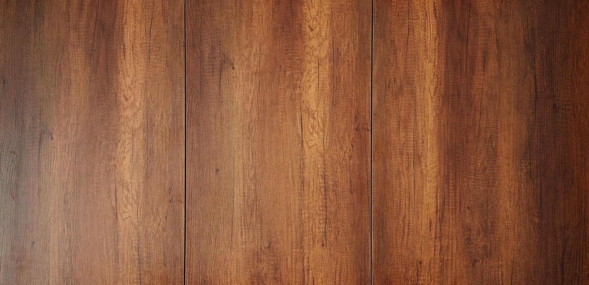 Laminate flooring installed in a modern Winter Park, FL living room, showcasing its durability