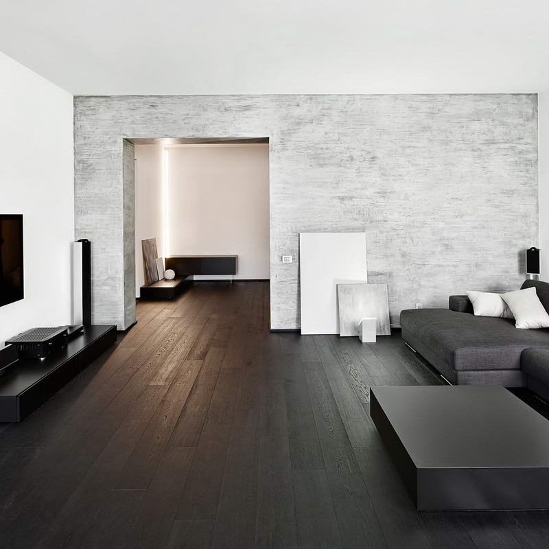 A living room with a couch and a television