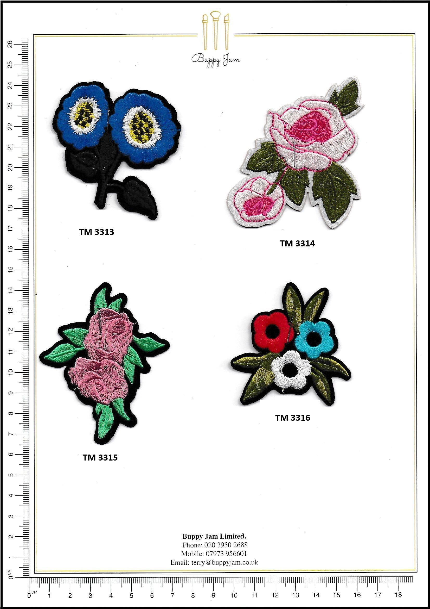 A sheet of paper with four different embroidered types of flowers on it.