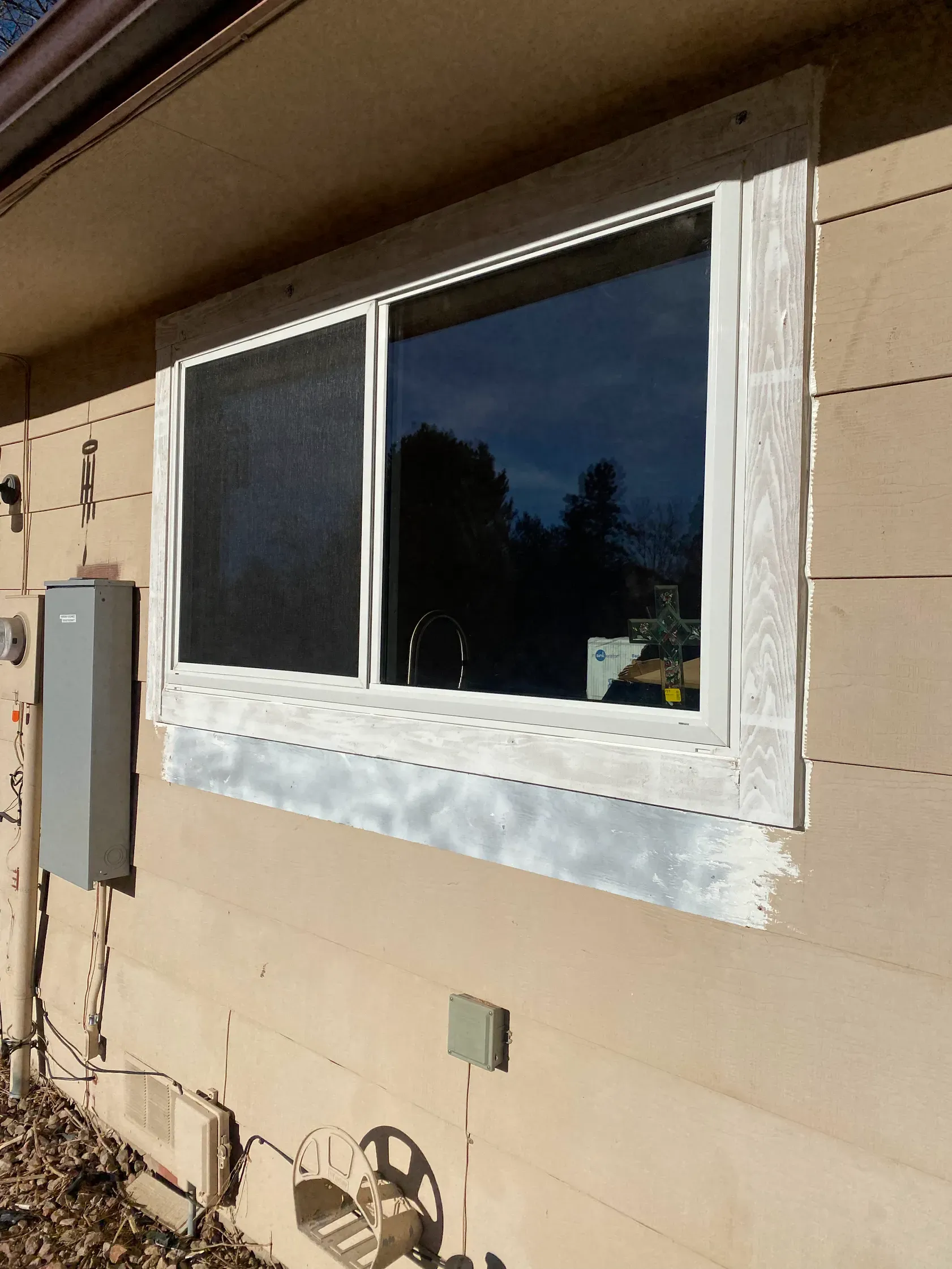 A house with a window on the side of it