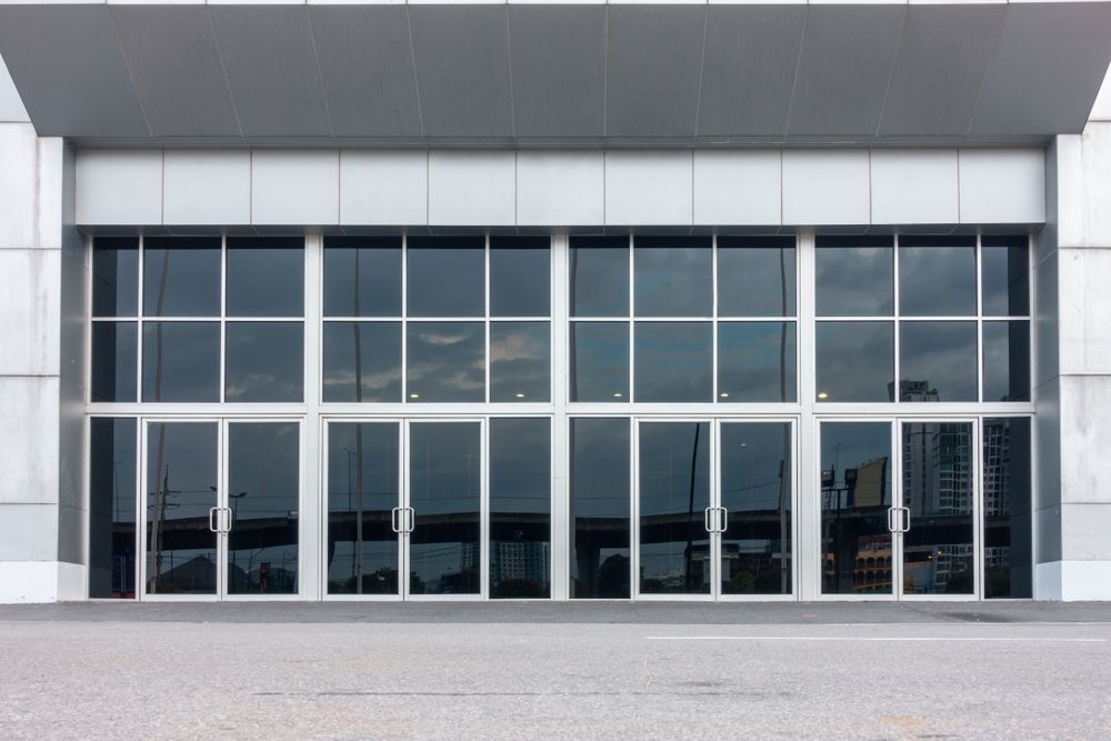 A Large Building With A Lot Of Windows And Doors — New England Glass & Aluminium In Uralla, NSW