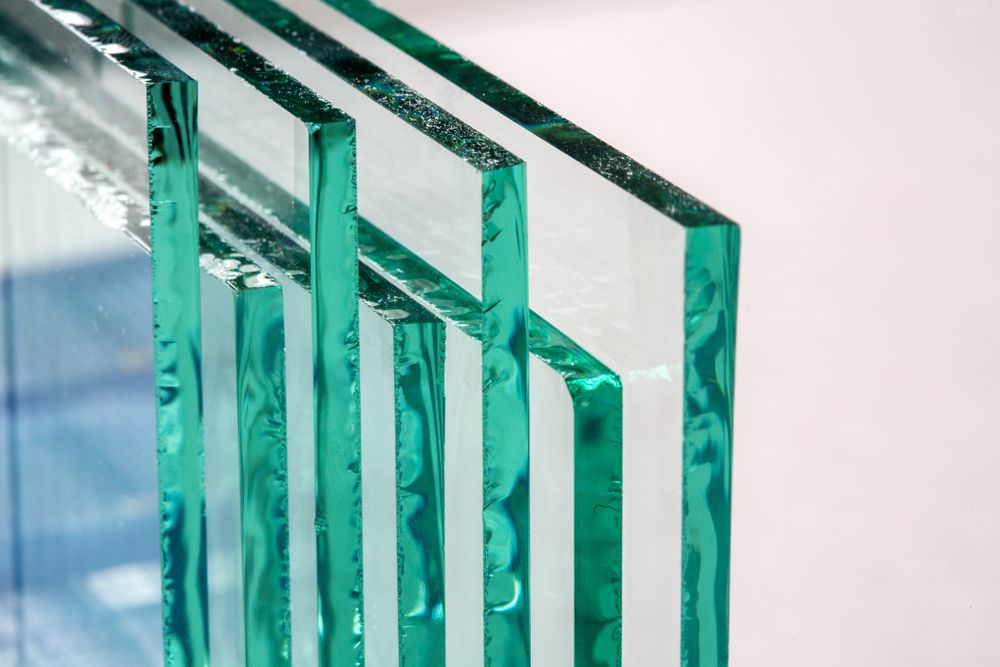 A Stack Of Clear Glass Pieces Stacked On Top Of Each Other — New England Glass & Aluminium In Armidale, NSW