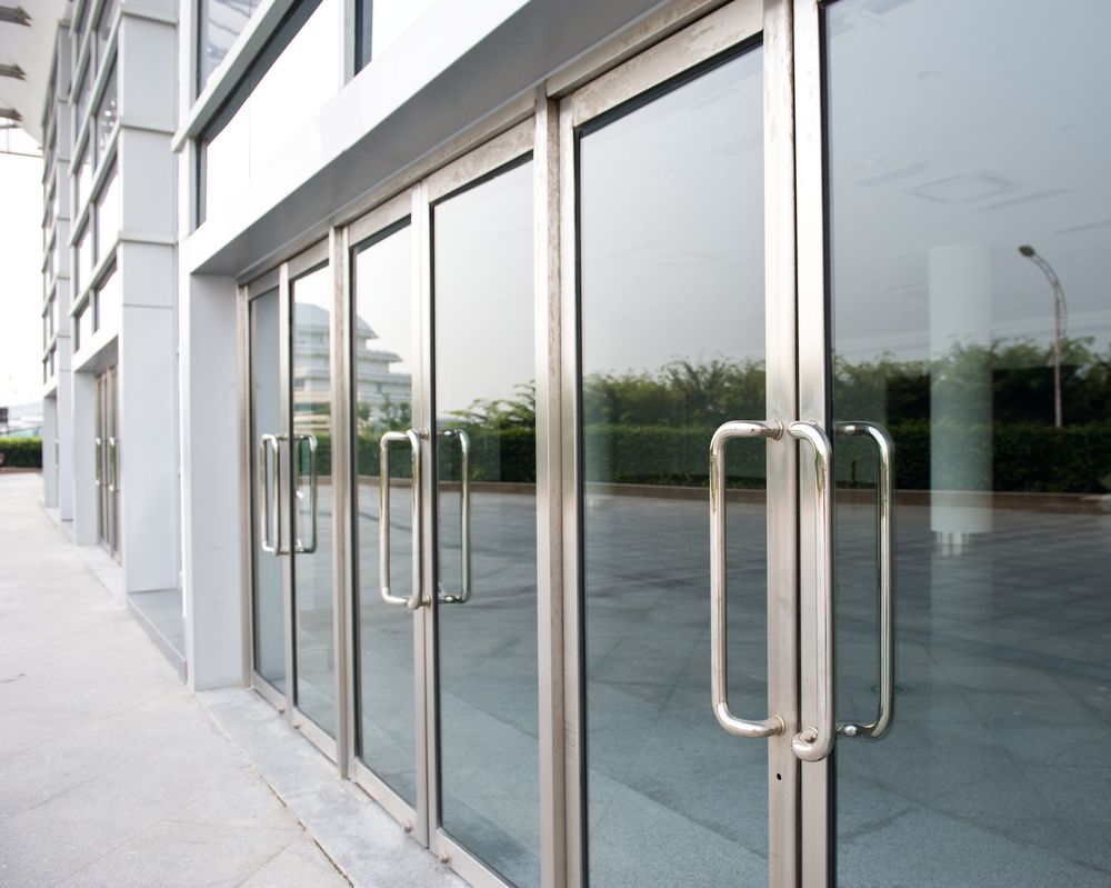 A Building With A Lot Of Glass Doors And Handles — New England Glass & Aluminium In Gunnedah, NSW