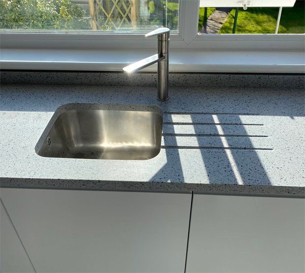 metal sink with tap