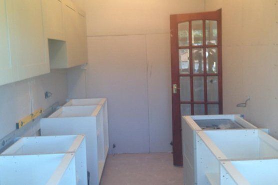 Kitchen being fitted in house