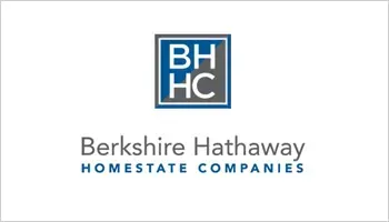 Berkshire Hathaway HomeServices logo with blue BHHC square above gray and blue company name