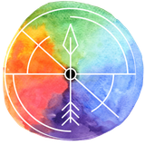 A rainbow colored circle with a compass arrow in the center.